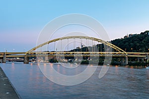 Fort Pitt Bridge and Monongahela River in Pittsburgh in Pennsylvania. Sunset Sky and Light