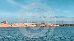 Fort Rikazli or Fort Ricasoli, Kalkara view from the sea. Gladiator arena in the middle of the fortress. Slow motion