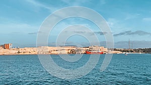 Fort Rikazli or Fort Ricasoli, Kalkara view from the sea. Gladiator arena in the middle of the fortress. Timelapse from