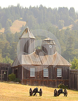 Fort Ross chapel and cannons photo