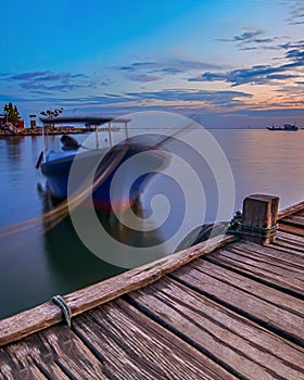 Sunrise at Old Pier Of Fort Rotterdam photo