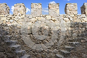 fort wall medieval stone tower in the city of Toledo, Spain, ancient fortification