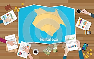 Fortaleza brazil ceara city region economy growth with team discuss on fold maps view from top