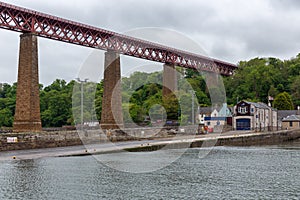 Forth Bridge and life-boat station near Queensferry in Scotland