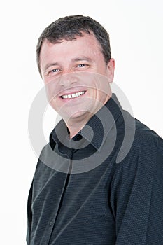 Forties handsome man in black shirt in white background