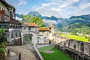 Fortification and entrance of the medieval village of Gruyeres in La Gruyere Switzerland