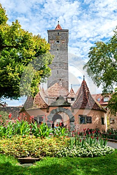 Fortified castle gate in the medieval old town of Rothenburg ob der Tauber in the Franconia region of Bavaria in Germany
