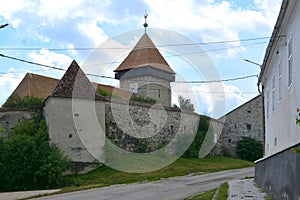 Fortified church. Typical rural landscape and peasant houses in  the village Drauseni, Transylvania, Romania.