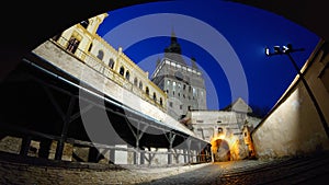 Fortified citadel of Sighisoara, Romania, by night - UNESCO heritage - historical landmarks