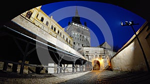 Fortified citadel of Sighisoara, Romania, by night - UNESCO heritage - historical landmarks