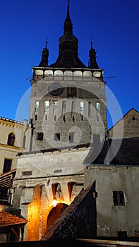 Fortified citadel of Sighisoara, Romania, by night - UNESCO heritage - historical landmarks