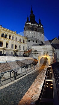 Fortified citadel of Sighisoara, Romania, by night - UNESCO heritage - historical landmarks