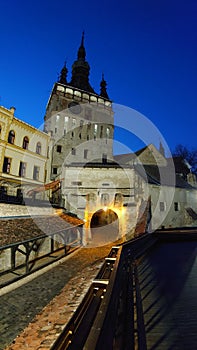 Fortified citadel of Sighisoara, Romania, by night - UNESCO heritage - historical landmarks