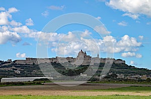 The fortified city of Mdina in Malta stands tall on the horizon