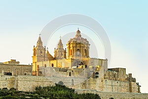 The fortified, formerly capital, city of Mdina with the dominant church of St Paul\'s Cathedral, Mdina, Malta, Europe.