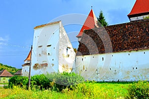 Fortified medieval saxon church in Dealu Frumos,, Transylvania, Romania. photo