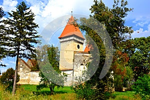 Fortified medieval saxon church in Dealu Frumos,, Transylvania, Romania. photo