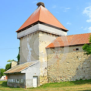Fortified medieval saxon evangelic church in the village Cata, Transylvania, Romania. photo