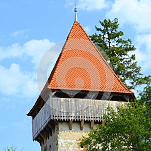 Fortified medieval saxon evangelic church in the village Cata, Transylvania, Romania. photo