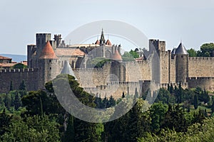 Medieval citadel walls of Carcassone in Spring in France photo