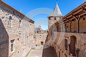 Fortified wide walls and observation towers of the medieval castle of Carcassonne town