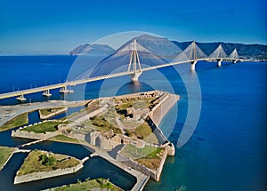 Fortress and bridge of Rio Antirio, Patra, Greece. Aerial drone bird`s eye view photo.