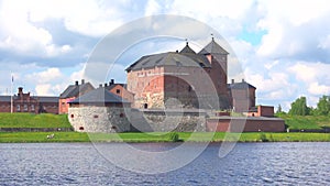 The fortress of Hameenlinna on lake Vanajavesi, sunny june day. Finland