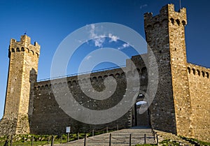 Montalcino castle in evening sunshine in Tuscany photo