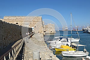 Fortress Koules with anchoring fishermen boats