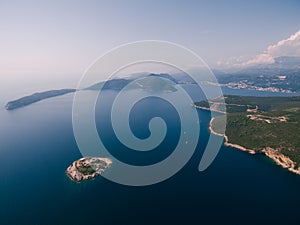 Fortress Mamula on the island against the backdrop of the mountains of Montenegro. Kotor Bay