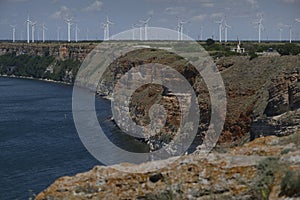 Fortress ruins on Kaliakra cape in Bulgaria Wind turbines