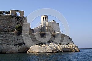 Fortress with a tower on the beach