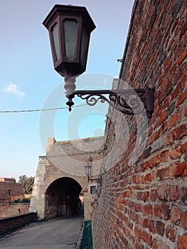 Fortress wall and the street lamp