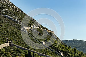 Fortress walls in Ston, called `Croatian Great Wall`. Ston is a settlement and a municipality in the Dubrovnik-Neretva County of