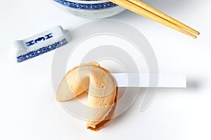 Fortune Cookie With Blank Slip and Bowl and Chopsticks