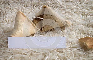 Fortune cookie on a rice bed