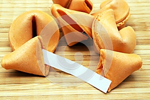 Fortune cookies on bamboo plater photo