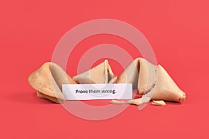 Fortune cookies with motivational text saying `Prove them wrong`