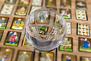 Fortune teller Crystal ball and in transparency tarot cards background