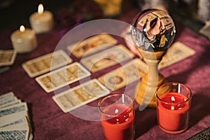Fortune teller table with tarot cards and magic ball