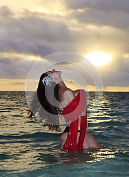 Forty year old woman in the ocean photo