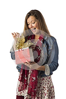 Forty year old woman opening gift bag