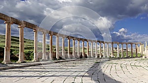 Forum (Oval Plaza) in Gerasa (Jerash), Jordan. Against the clouds, with zoom