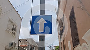 Forward arrow road sign blue and white