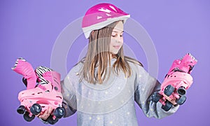 Forward to adventures. Girl cute teen wear helmet and roller skates on violet background. Active leisure and lifestyle