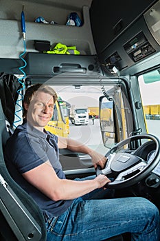 Forwarder or truck driver in drivers cap