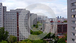 Forwards fly through highrise buildings in East Berlin, Germany.