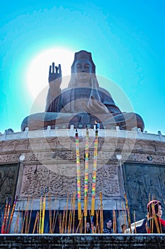 Great Guanyin buddha or `Goddess of Mercy ` statue on top of Xiqiao mountain.Foshan city China