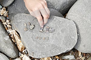 Fossil hunting at Charmouth beach Dorset England.