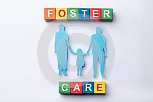 Foster Care Cubic Blocks With Family Figures photo